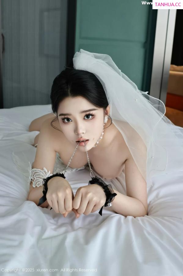   [XiuRen]高清写真图 2025.07.18 No.10559 糯梨子 白色婚纱第47张图片